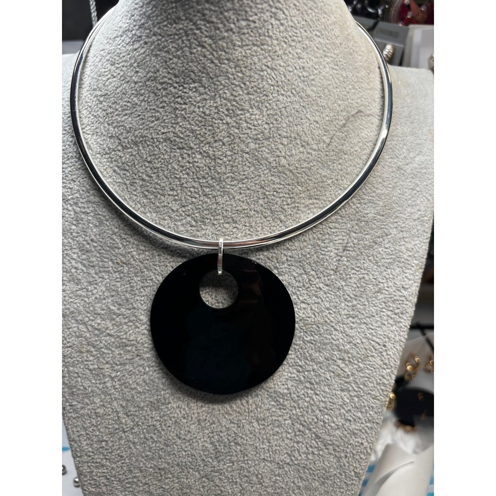 #7. High-Gloss Black Disc Choker with Cutout
